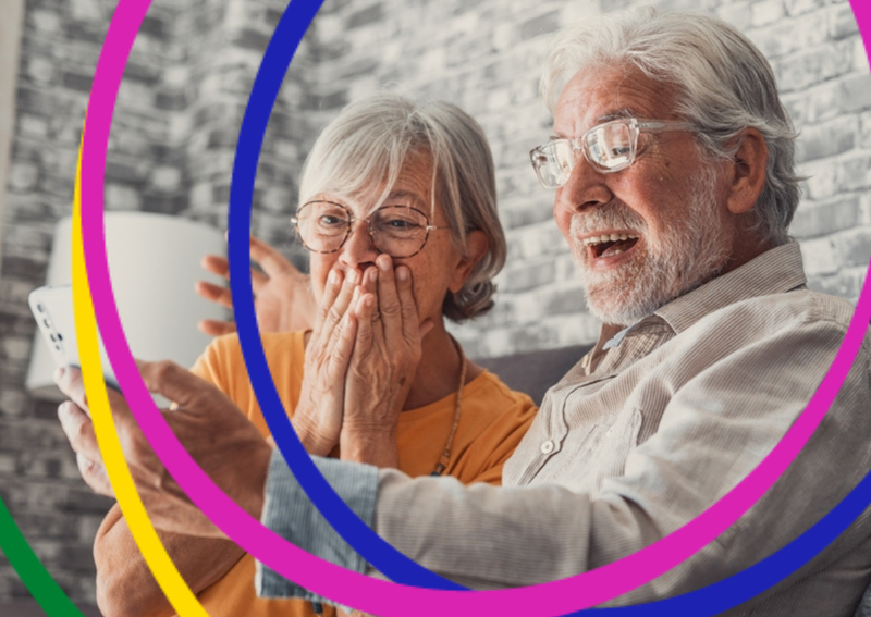 An image of two excited people who may have won something on the lottery